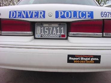 Denver Police vehicle with Report Illegal Guns sticker