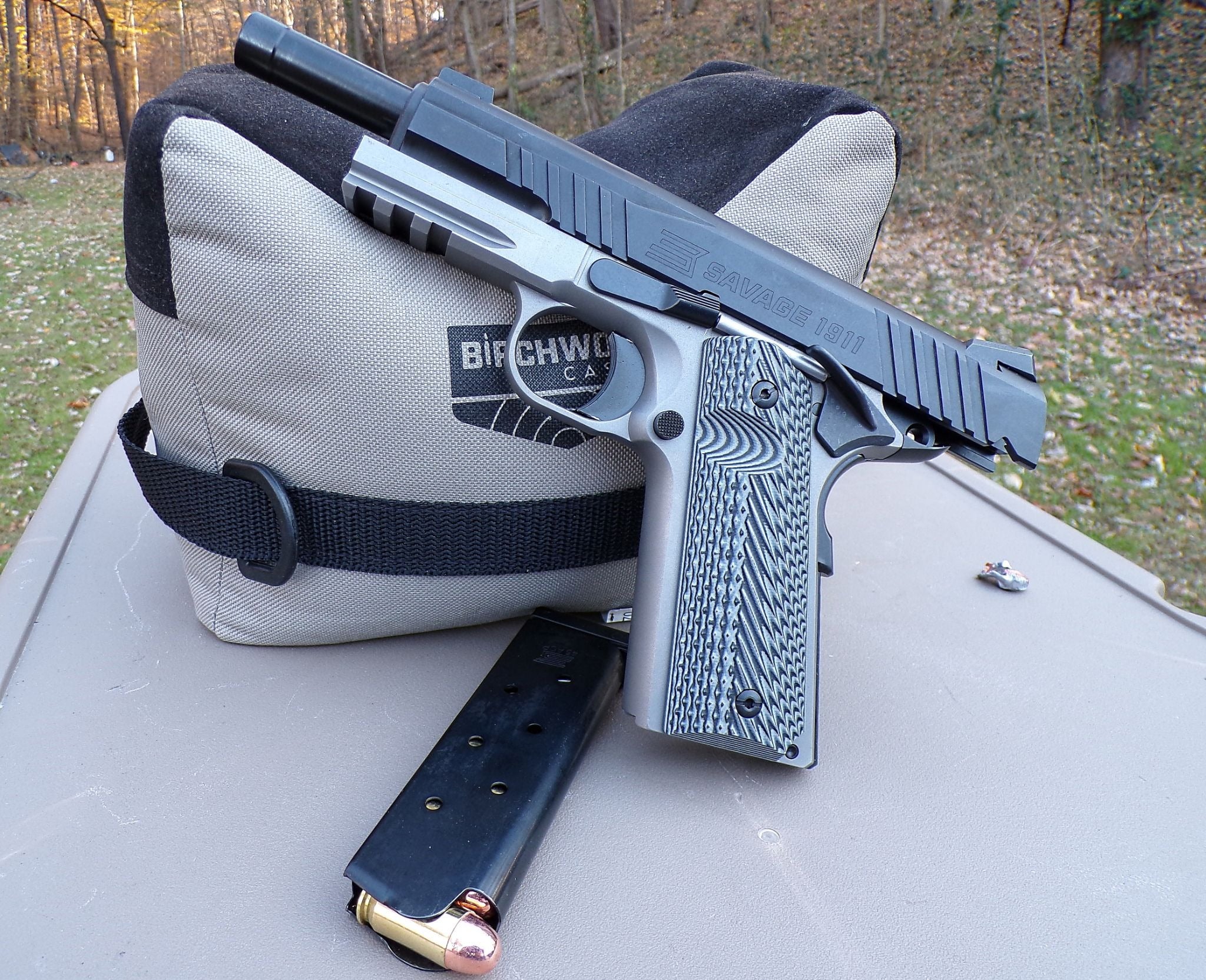 Savage 1911 two-tone pistol with stainless frame and black slide