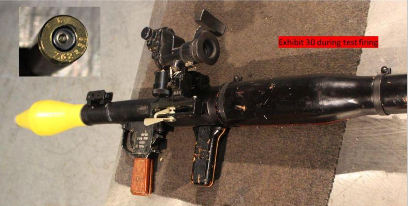 Patrick “Tate” Adamiak’s seized inert RPG displayed as evidence in court
