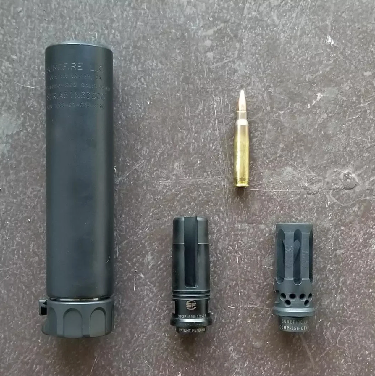 SureFire SOCOM suppressor with Fast-Attach mount on rifle barrel