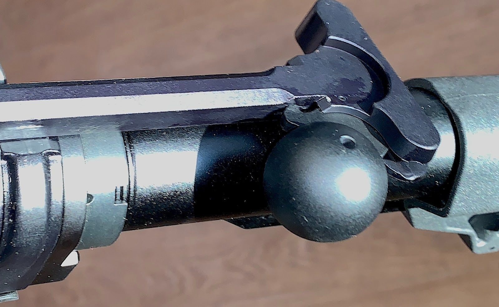 Luth-AR Globe Charging Handle installed on AR-15 rifle