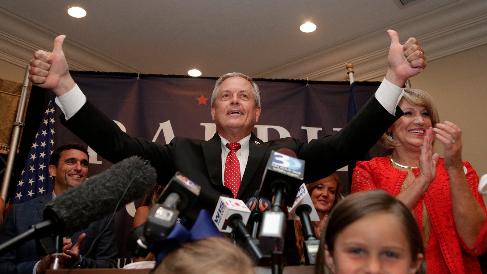 Rep. Ralph Norman places a revolver on a diner table during a meeting with constituents