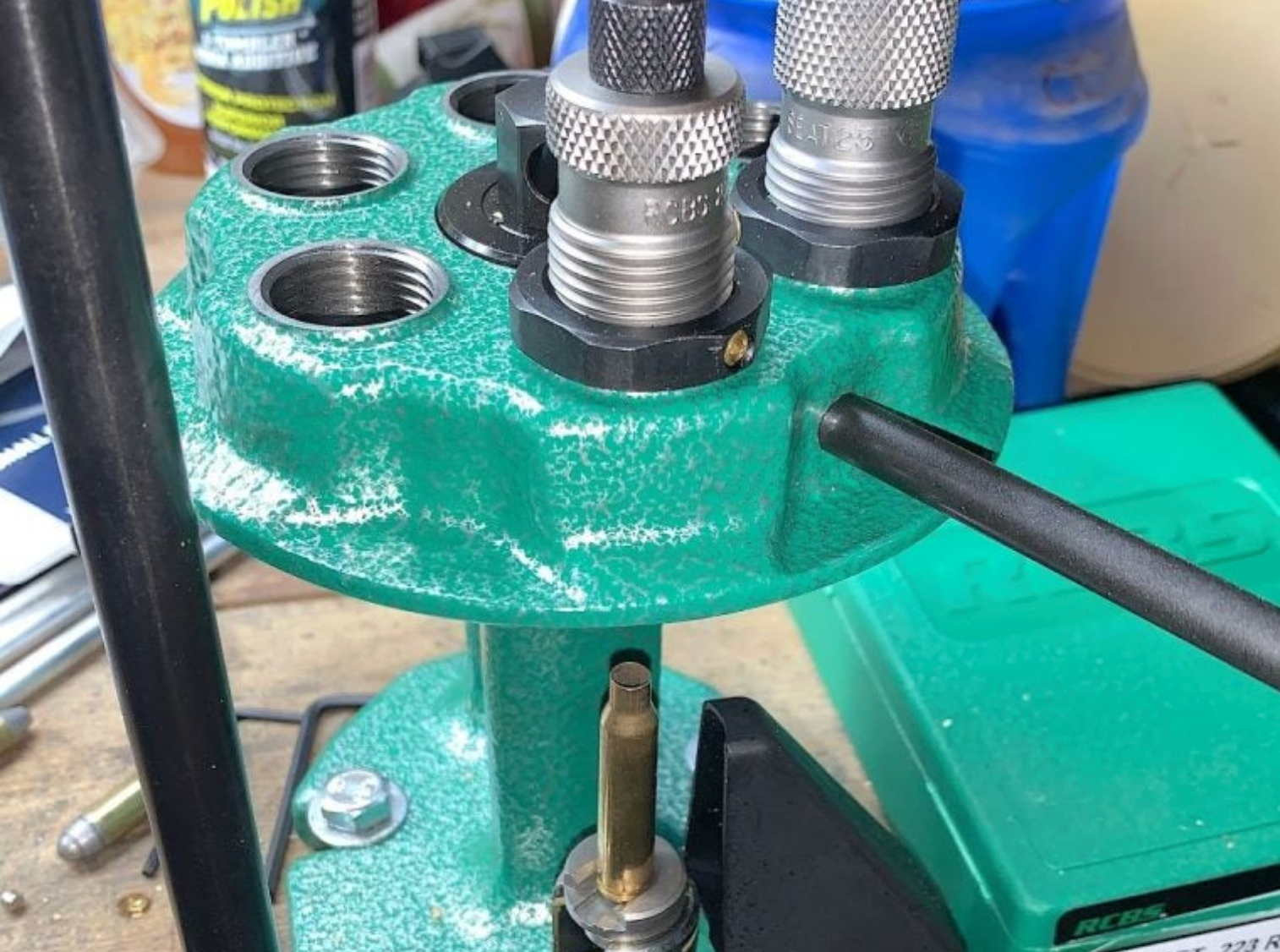 RCBS Turret Press set up on a reloading bench with .223 cartridges and dies installed