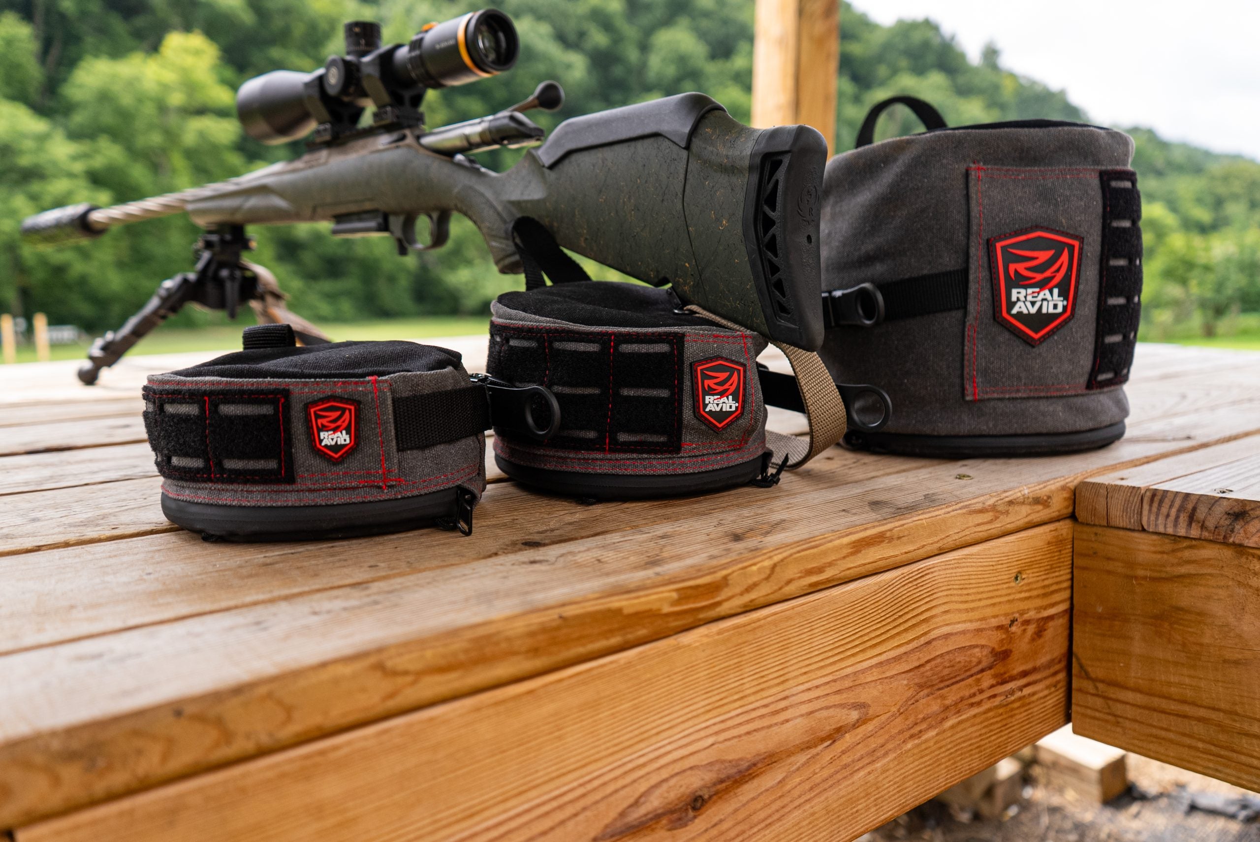 Real Avid Ratchet Rest adjustable shooting bag supporting a rifle
