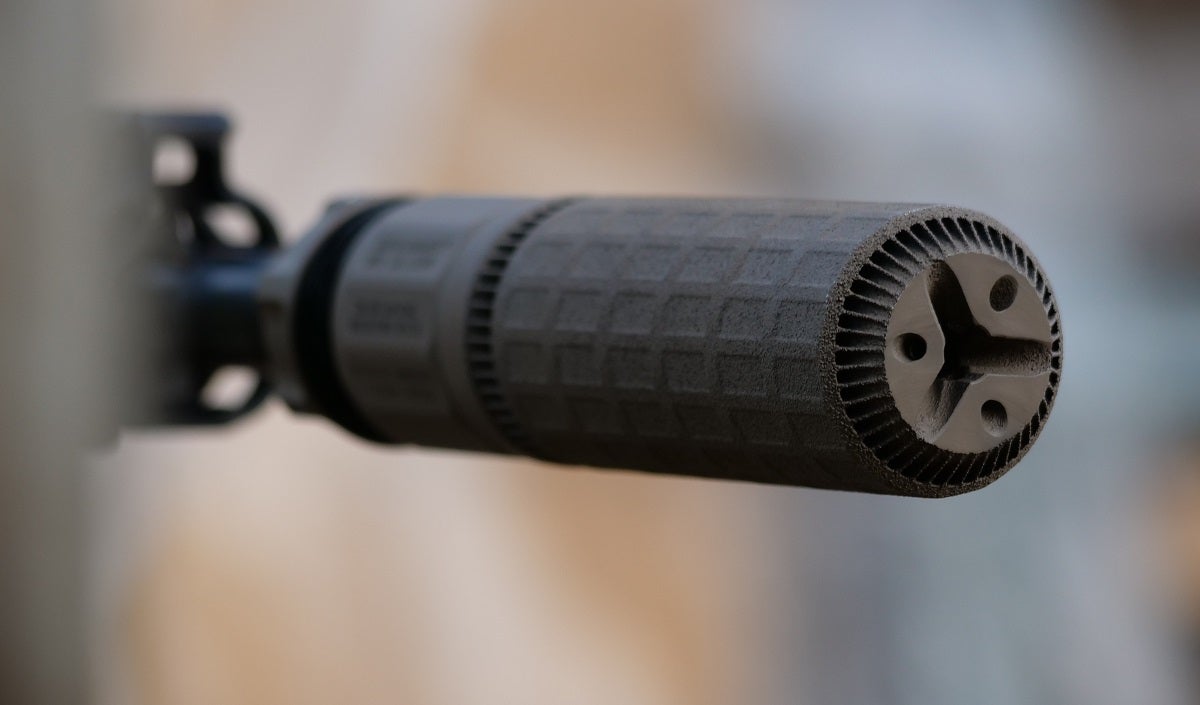 Griffin Armament HRT-556 AM suppressor mounted on a 5.56 rifle