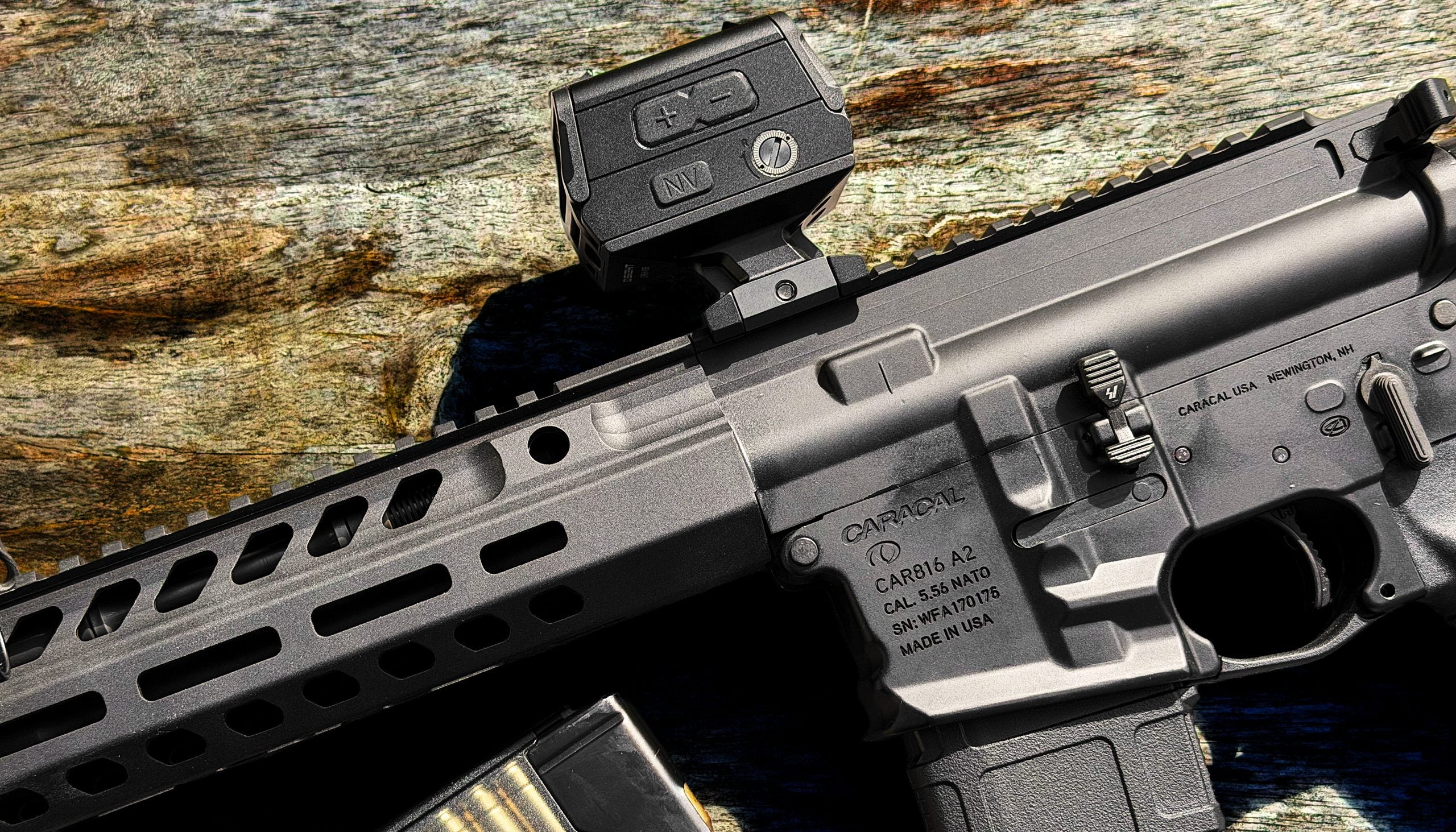 Osight R enclosed red dot sight mounted on a Caracal 816 rifle